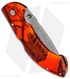 Buck Knives Buck Folding Omni Hunter 10PT Knife Orange Mossy Oak (3" Satin Plain) 6 Buck Knives Buck Folding Omni Hunter 10PT Knife Orange Mossy Oak (3" Satin Plain) -Buck Knives Shop Buck Folding Omni Hunter 10PT Orange Mossy Oak 0395CMS9 C BHQ 50635 jr side